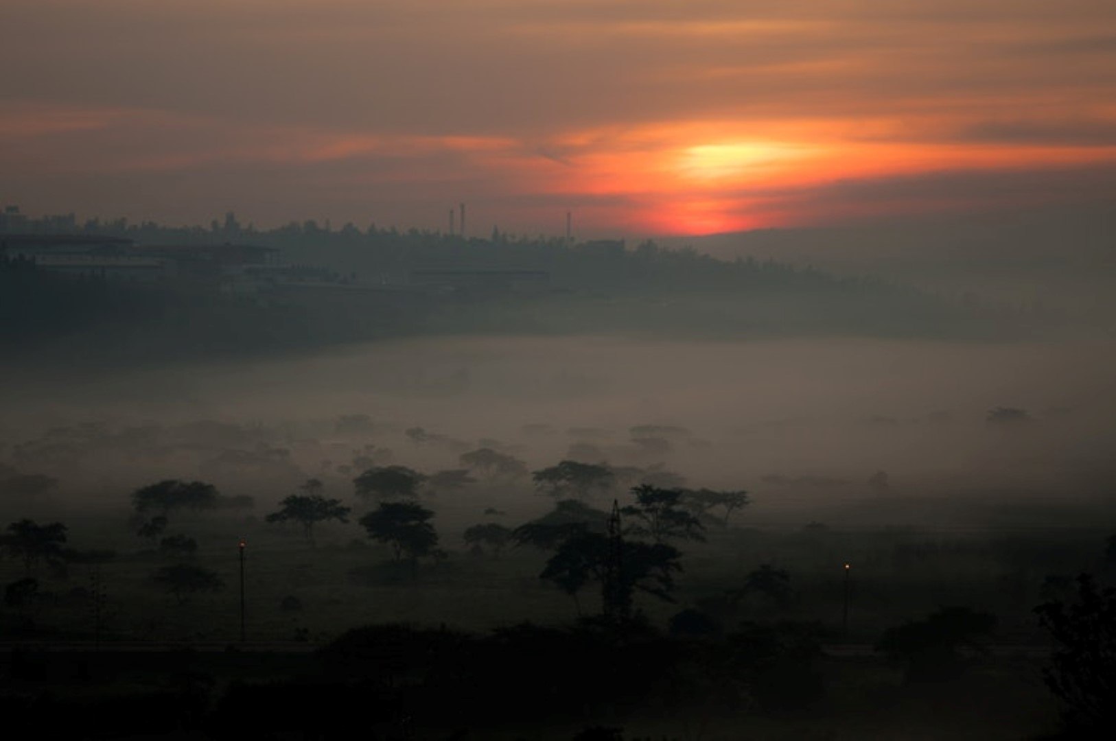 Misty landscape at sunrise in Rwanda, East Africa